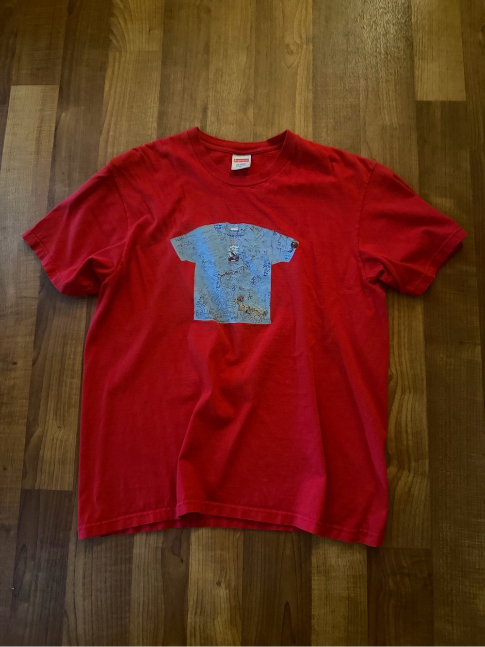 SUPREME: shirt-on-shirt red men’s shirt